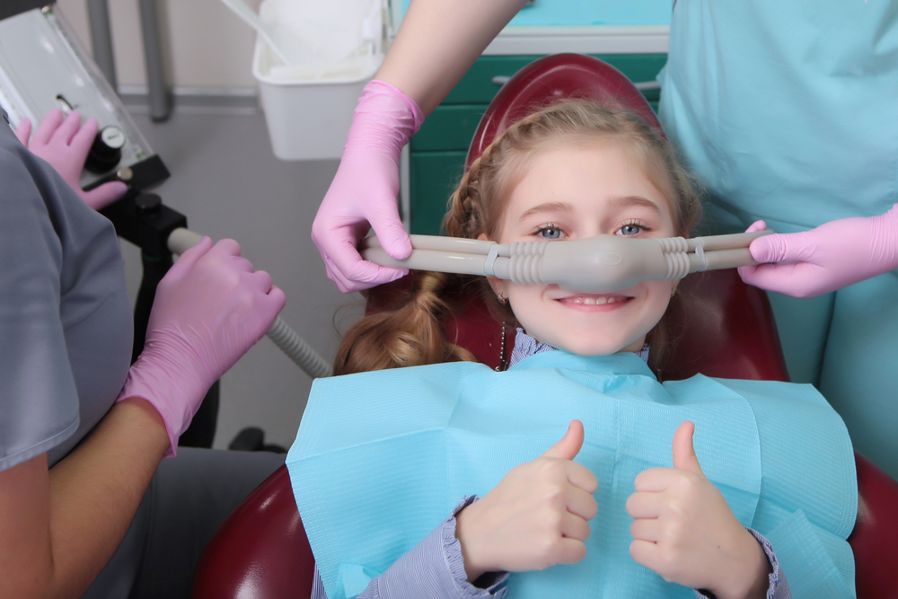 A,Little,Girl,Is,Comfortable,To,Treat,Her,Teeth,Under A,Little,Girl,Is,Comfortable,To,Treat,Her,Teeth,Under